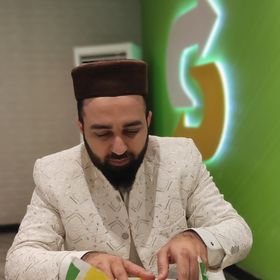 Man in traditional attire, possibly discussing email marketing strategies.
