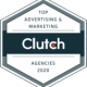 A hexagonal badge with the text: Top Advertising & Marketing Clutch Agencies 2020 in white and gray, with a dark center and a thin blue and gray border.